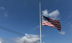 US Flag at Half Staff over Ballistic Armor Co. Headquarters