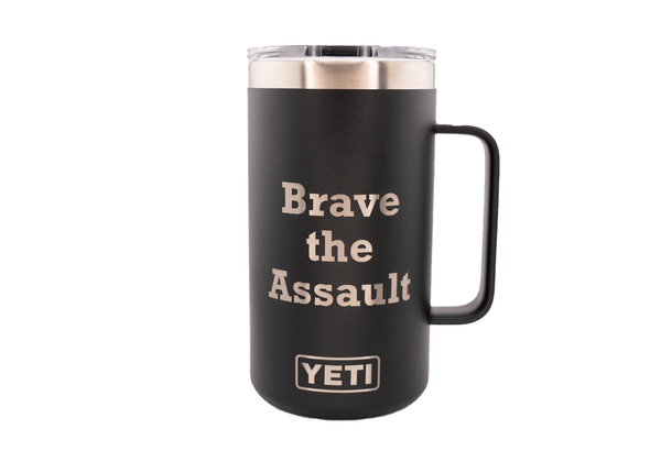 Black Yeti mug with engraved text "Brave the Assault"